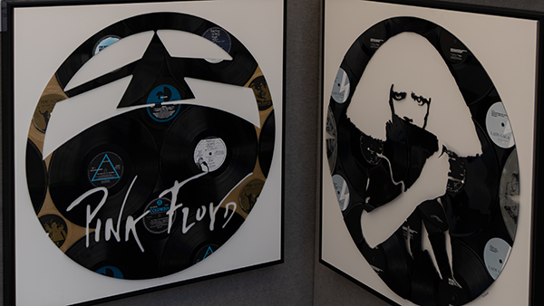 Artwork made from vinyl; on the left is Pink Floyd with the image from their album Dark Side of the Moon. On the right is a recreation of the album cover for Lady Gaga's The Fame Monster.