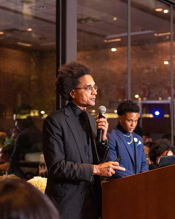 A picture of Dr. Alexander Byrd speaking to students attending the Black Excellence Gala at Rice University.