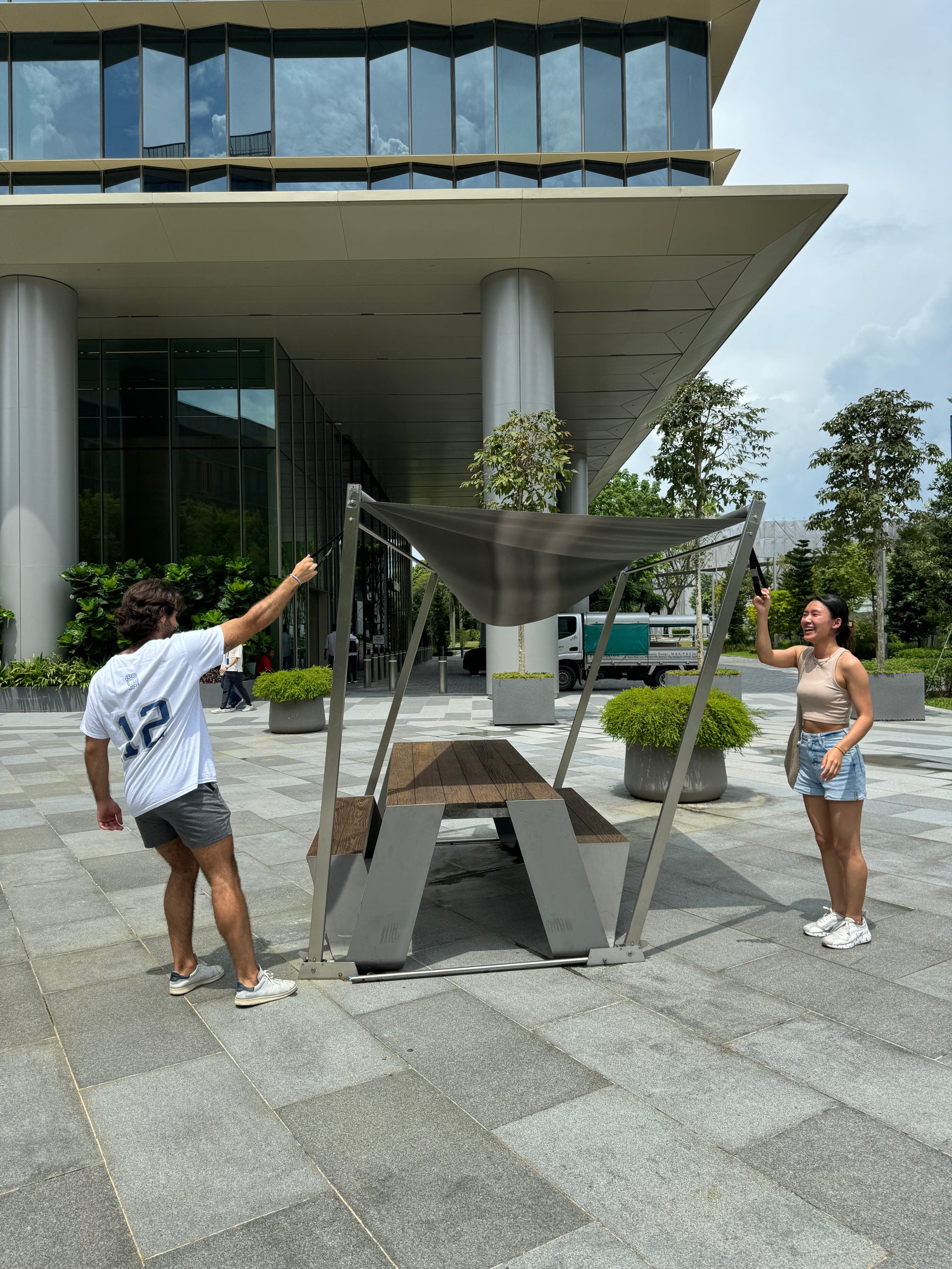 A photo of students in front of Oasis Terraces.
