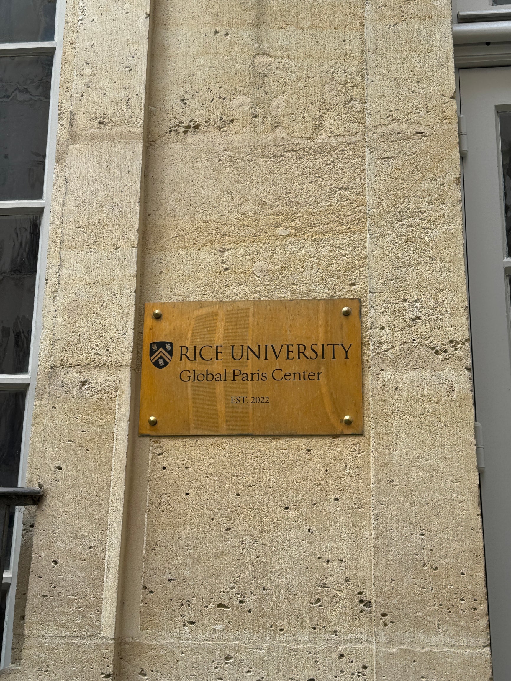 A photo of the Rice Global Paris plaque.