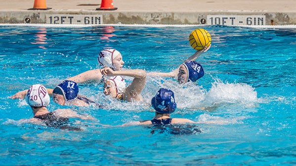 A photo of the Rice women's water polo team.