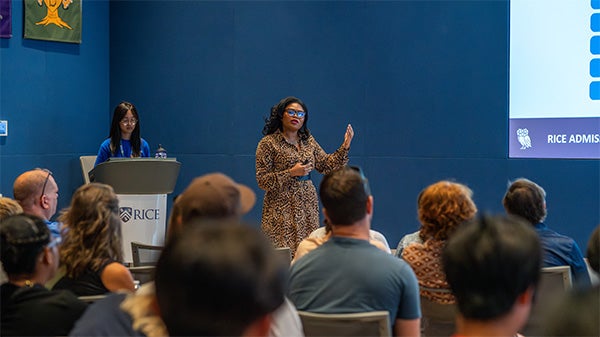An admission counselor giving a presentation at Rice.