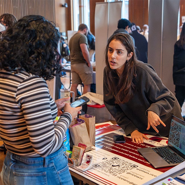 Each table at the fair offers info on how to join the organization and stay updated on upcoming events.