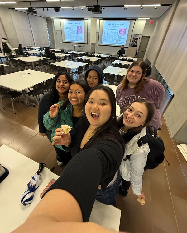 Selfie of many people in a classroom