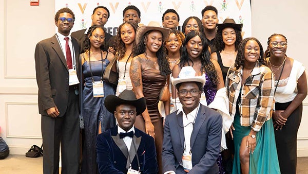 Large group of people in formal attire