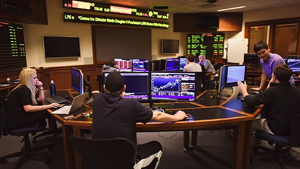 Room with stock prices and computers