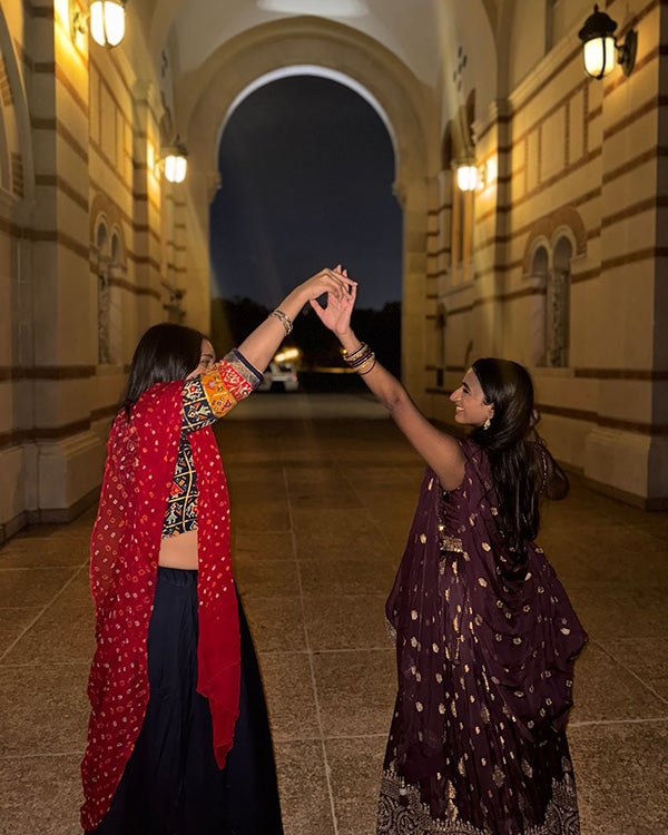 Two girls dancing together