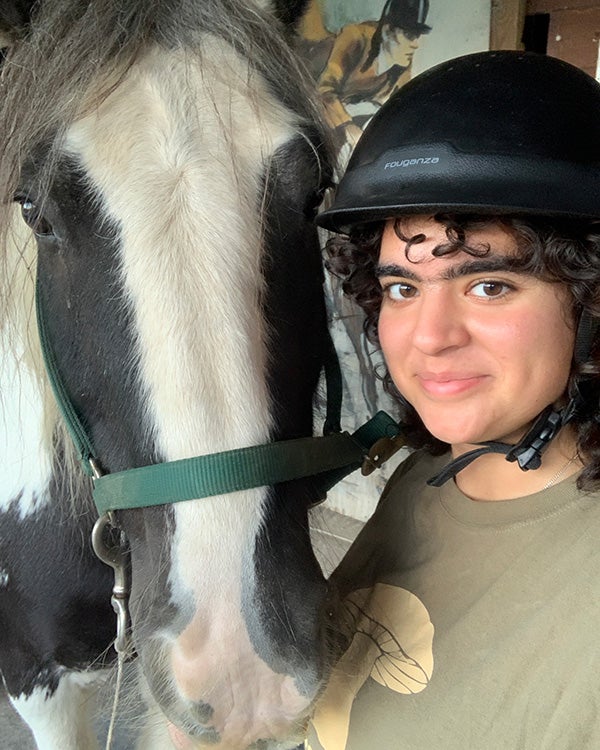 Selfie of girl with horse