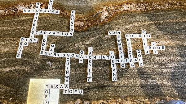 Bananagrams tiles arranged in a crossword manner