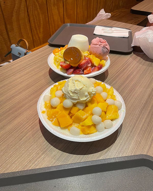 Two large plates with round balls of food