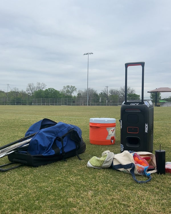 Luggage on grassy turf terrain