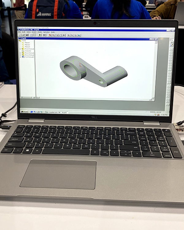 computer with a 3d graphic modeling software on it