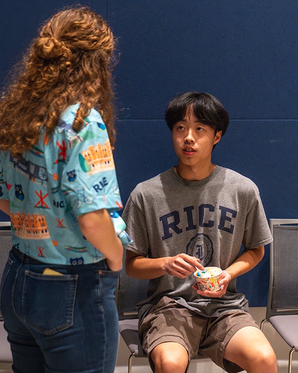 A person talking to someone else