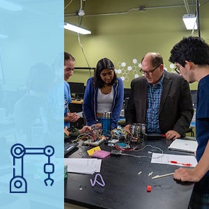 Students gather to look at a demonstration inside OEDK lab