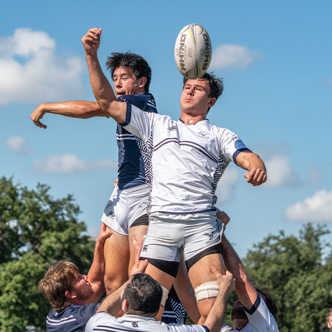 Rice Rugby current student versus alumni game starts with a lift off