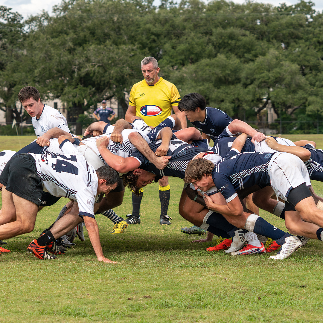 Scrum match at Rice Rugby alumni vs current student game 