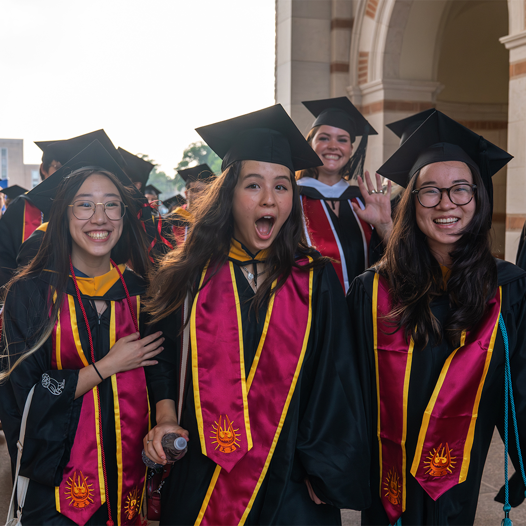 It is Rice tradition for new graduates to walk through the sallyport of Lovett hall.