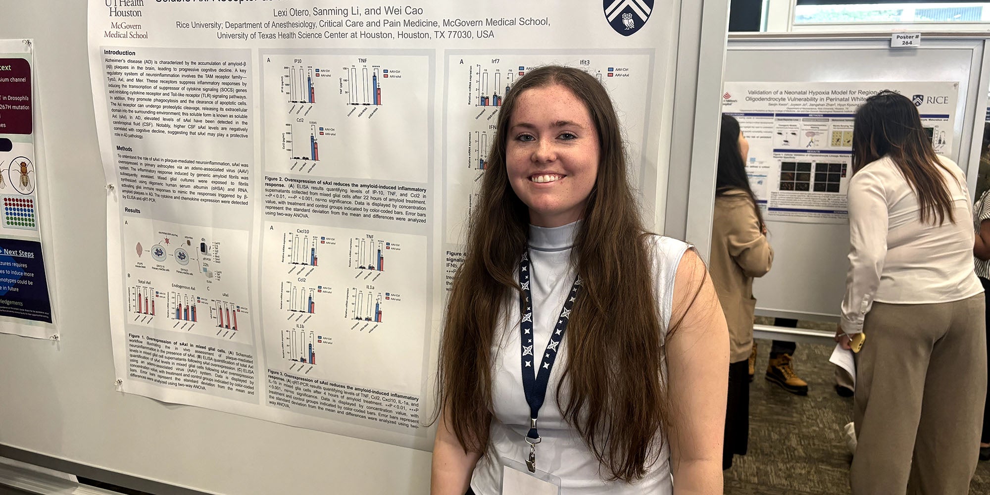 A girl standing in front of a research poster