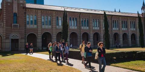 A wide picture of the outside of the side Sewall Hall on Rice University's campus.
