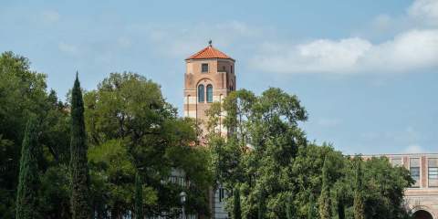 A wide photo of the Pitman Tower, which is the tower attached to the Humanities Building on Rice's campus.