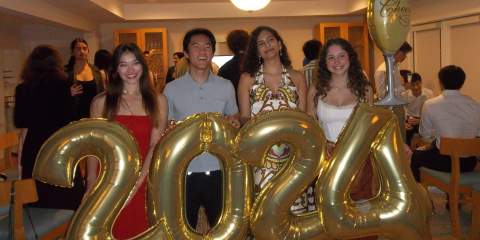 Rice seniors holding 2024 party photos.