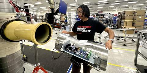 A girl working in an engineering lab