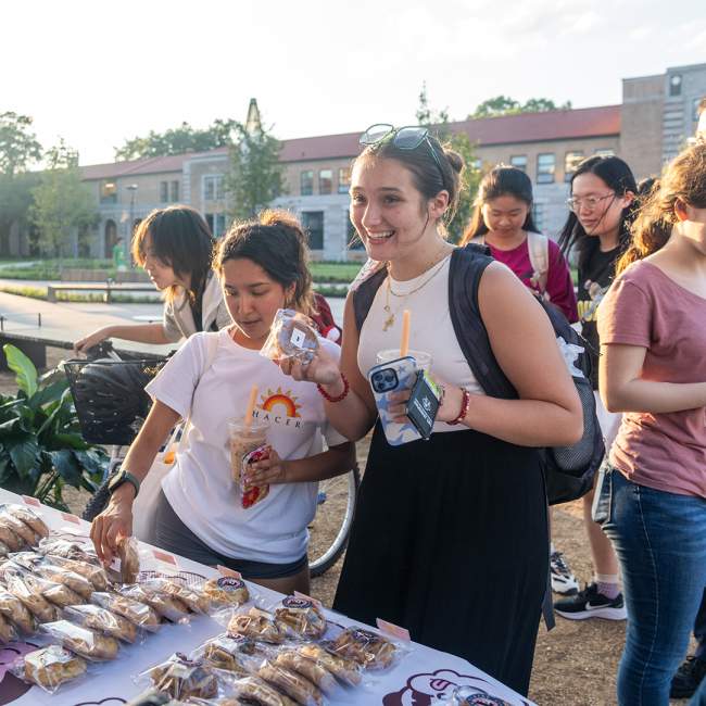 Students celebrating the new Academic Quad get in line for a treat!
